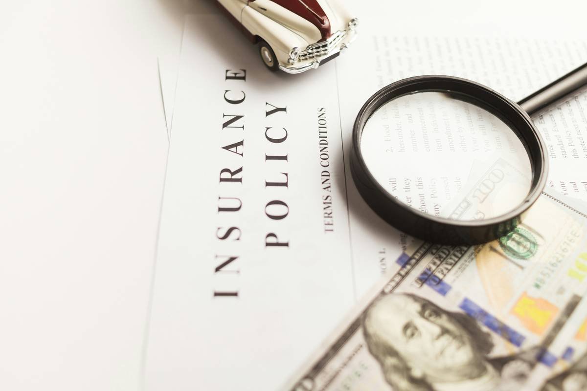 Traveler comparing Exchange Rate Lock Policies options on laptop while planning trip